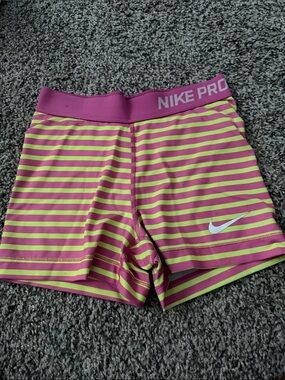 Nike Pro Pink and Neon Yellow Striped Athletic Shorts